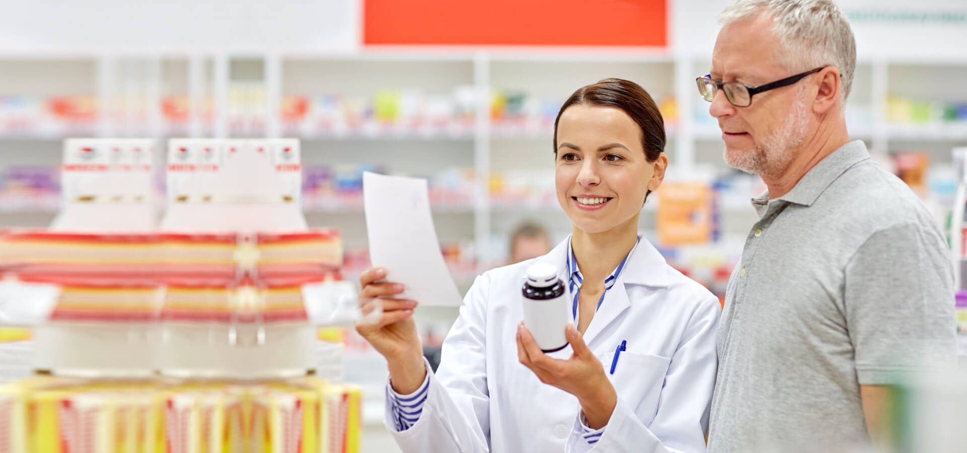 happy pharmacist and senior man customer